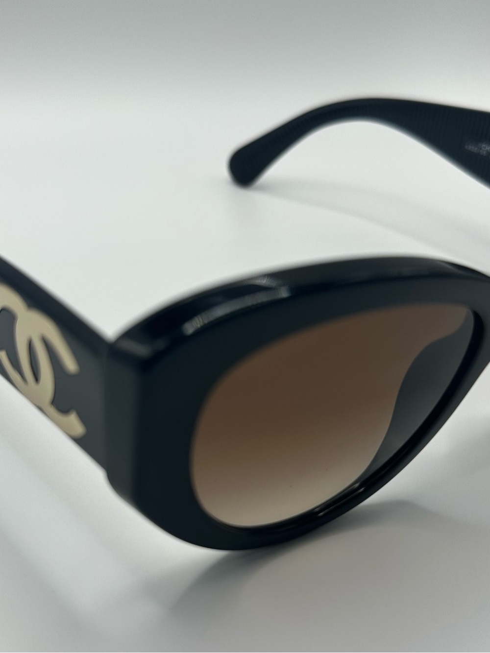 CHANEL Black Oversized Cat-Eye Sunglasses with Brown Lenses